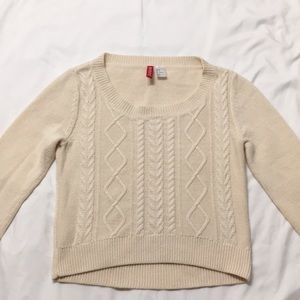 Beige sweater.